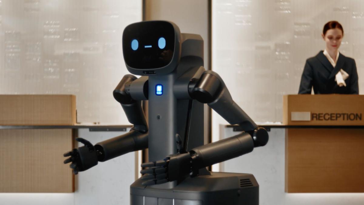 Robot con inteligencia artificial atendiendo a clientes en recepción de empresa