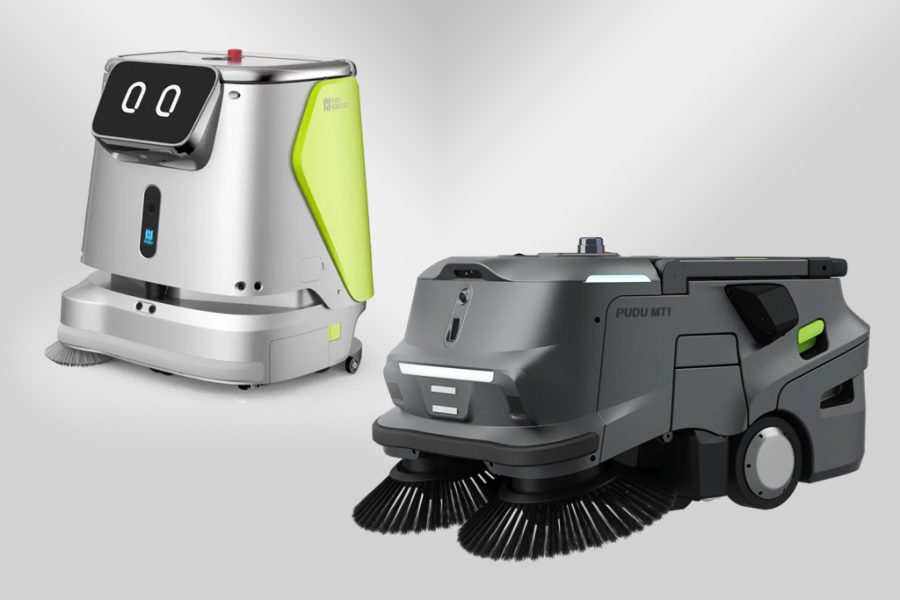 Robots Pudu CC1 y MT1 limpiando nave industrial con obstáculos